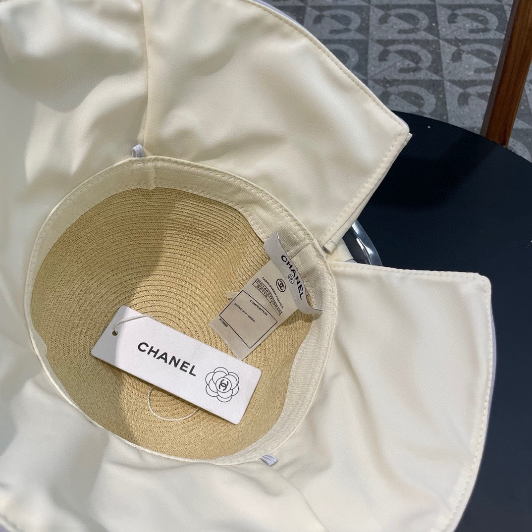 BOW BUCKET HAT IN PALE PURPLE MIX BEIGE RAFFIA 426169